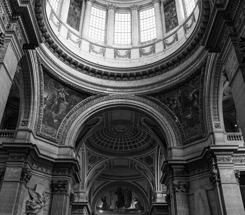 a large ornate building with statues